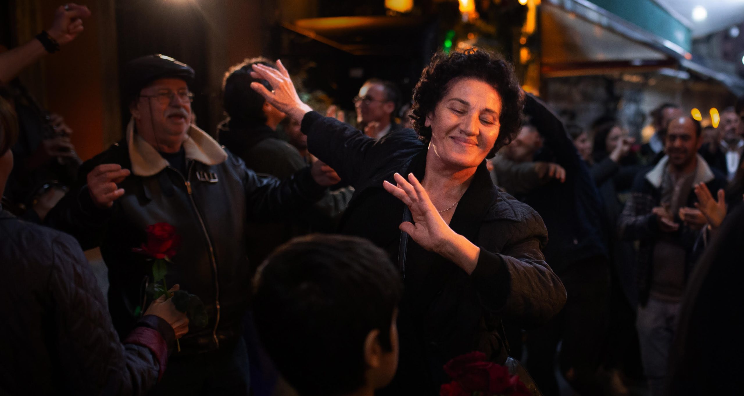 Lia dancing on the streets of Istanbul by night. Still from Crossing (2024) dir. Levan Akin. Courtesy of the artist and MUBI.